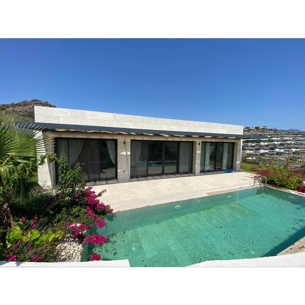 Located in a prestigious site in Yalıkavak, the popular district of Bodrum; Magnificent luxury villa for sale with private pool and large garden.